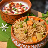 Veg pulao- pomegranate raita